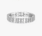 Silver ring with diamond accents on a white background